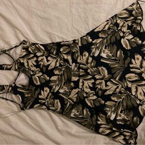 woman black and gray bodysuit size small,never worn